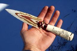 A knife carved from a whale tooth 
