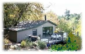 Little Cottage in the Woods.  Although this is not the exact one I'm thinking of next to lyman, known as Olin House, it is quite similar and a most enviable location for the arb director to set up base.  It used to be short-term housing for visiting professors.
