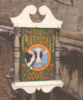 The Contented Cow Pub, an ersatz british pub set downtown by the river. It really is the nicest bar in town, set in a picturesque dirty alley, mostly servicing tourists who have come to shop at the boutiques nearby. 