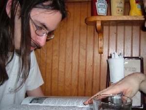 Sean is reading the ARDA big old orange Main Volume, and Matt is pointing to the appropriate passage. 